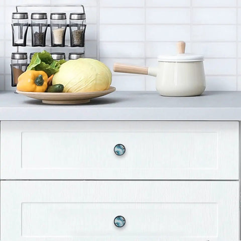 4 Pack Blue Marble Texture Round Cabinet Knobs, 1.37 Inch Drawer Pulls For Kitchen Cabinets Dressers And Closets on white drawers.