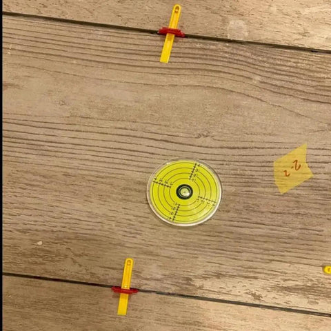 Rock Solid 80mm Round Spirit Level Featuring Degree Marked Surface And Oversized Bubble For Bang On Readings Heavy Duty Circular Measuring Device on wooden surface