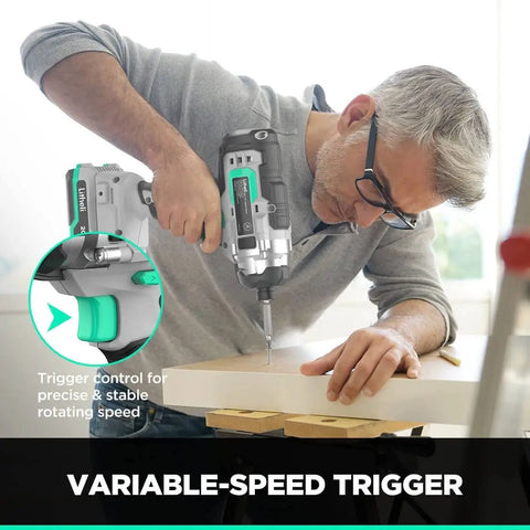 Man using 20V Cordless Drill and Impact Driver Combo Kit With 220 InLbs Drill Torque 1150 InLbs Impact Torque for DIY project