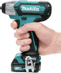 Hand holding 12V Max CXT Impact Wrench Kit With Ultra Compact Six Inch Body No Fuss Weighs Just 2.3 Lb Battery Included