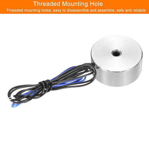 Robust Round Solenoid Electromagnet DC 24V Punching Out Fifty Newton Pull For Automation Machinery with wires and threaded hole.