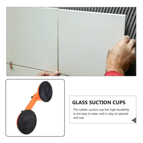 Person using Heavy Duty Dual Sucker Glass Lifter For Heavy Loads Up To 60Kg to install tiles on a wall.