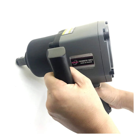 Heavy Duty One Inch Air Impact Wrench With Killer 1600 Nm Torque to rip through stubborn M32 bolts, held in hand.