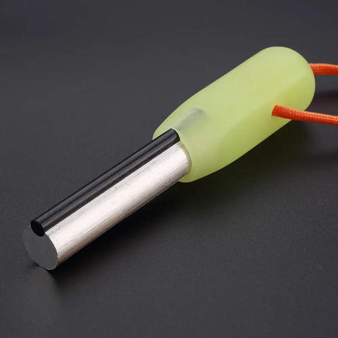 Grab And Go Emergency Fire Starter Kit with magnesium and ferro rods, luminous green handle, shown with paracord lanyard.