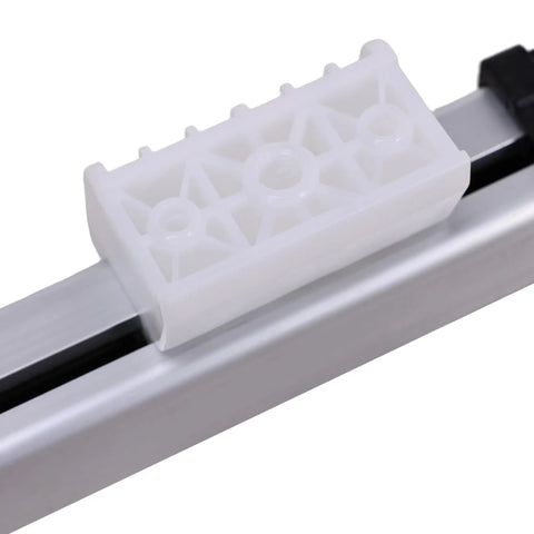 Close-up of KDPT005190 Linear Actuator component showing white plastic part on metallic rail, for power recliner lift chair replacement.