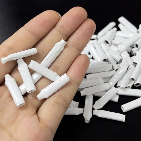 Hand holding 100 Pack White Dry B Wire Connectors for Low Voltage Splices Indoor Use 18 to 30 Gauge Brass Crimp Non Gel