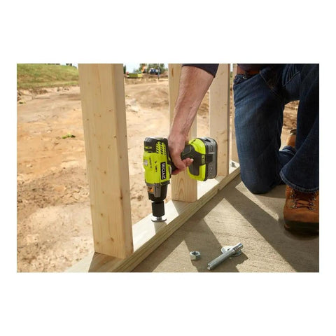 Person using the P1833 3-Speed 1/2-Inch Impact Wrench Kit With 4.0Ah Battery to secure wooden frame outdoors
