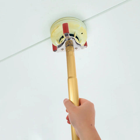 Ladder Free Smoke Transducer Assembly Tool With Heavy Hitter Sensor Head For High Ceiling Detectors, holding golden pole with sensor grip.
