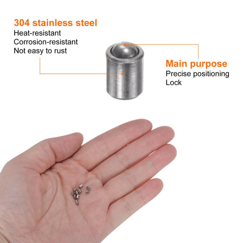 Thirty Piece Top Shelf Ball Point Spring Plungers 304 Stainless Steel 2X3mm Precision Positioning Beads Ball Catch Latch For Cabinet Doors And Slick Furniture Hardware held in hand with 304 stainless steel plunger.