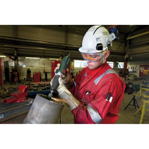 Pro Grade Variable Speed Die Grinder 10000 To 30500 Rpm 6.4 Amp Rotary Tool being used for metal shaping in a workshop.