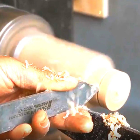 Wide Standard Carbide Wood Parting Tool For Heavy Duty Woodturning Grooving And Cutting shown in use on a lathe with wood shavings.