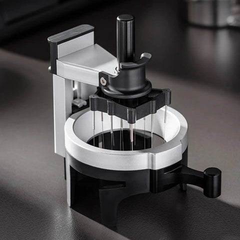 Heavy Hitter Rotary Espresso Puck Distributor Tool Featuring Adjustable Height And 12 Precision Points To Crush Clumps Level Coffee Grounds Evenly Compact Barista Accessory For Home Daily Driver Setup on a flat surface.