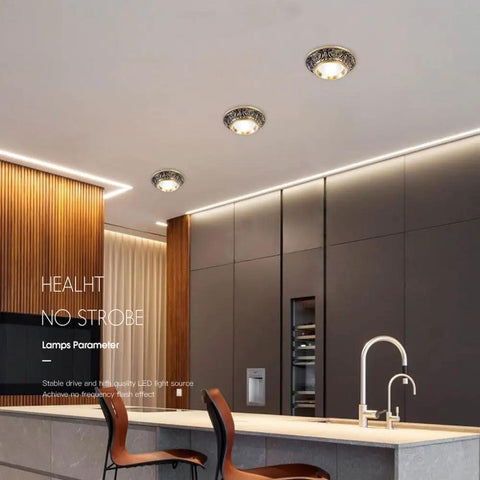 Ten Pack Brushed Brass Led Downlights 10 Watt Dimmable Eyeball Spotlights No Fuss Recessed Lighting Kit installed in modern kitchen.