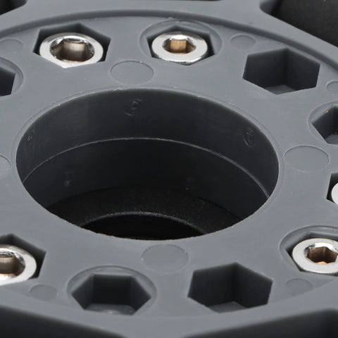 Close-up of 100mm omni wheels for robots with durable nylon-rubber design and precise holes for mounting stability and performance.