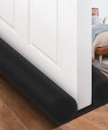 32 Inch Door Draft Stopper Foam Blocker For Interior Doors Black Door Sweep and Bottom Seal on white door, reduces drafts