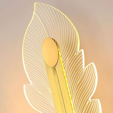 Hella Smooth Game Changing Geometric LED Wall Sconce With Dope Phoenix Tail Design and Acrylic Shade close-up view with light.