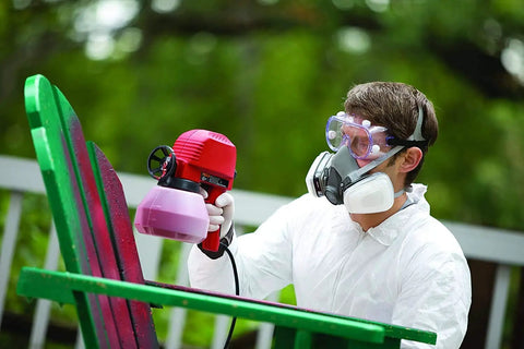 Built Tough Chemical Splash Safety Goggles With Anti Fog Vents And Impact Resistant Polycarbonate Lenses And Jobsite Approved Eye Protection For Hard Working Pros And Tradesmen Ready For Any Messy Task worn while spraying paint.
