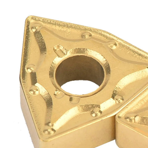 Close-up of 10 Pieces WNMG 432 And WNMG0804 CNC Carbide Inserts with high-density coated finish for lathe milling tools.