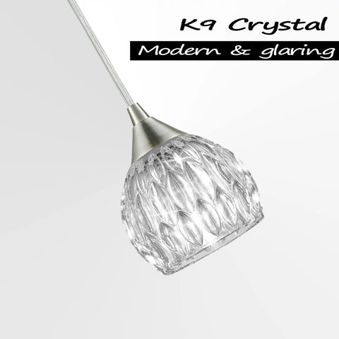 Close-up of a Three Pack Modern Mini Glass Pendant Light with crystal clear shade, nickel finish, for kitchen island, ETL listed, E12 base.