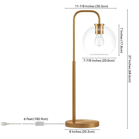 Lit 27 Inch Tall Arc Table Lamp With Clear Glass Globe Shade And Brass Accents Handcrafted Steel Base 6 Ft Cord illustration
