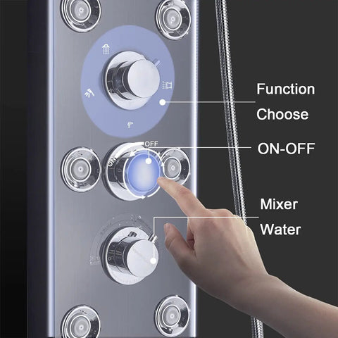 Hand adjusting controls on LED Rainfall Shower Panel Tower With Waterfall Handheld Tub Spout And Massage Jets Temperature Display.
