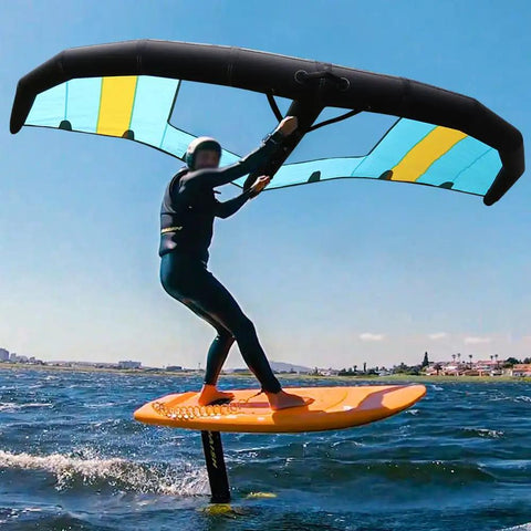 Person using Inflatable Wing Surfboard With 5 Meter Handheld Wing Foil Kite Window for windsurfing in sunny waters.