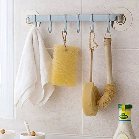 No Drill Hassle Self Adhesive Towel Rack Wall Mount Hook With Hella Strong Grip For Bathroom Kitchen And Living Room Totally Rad Space Saving Storage Solution Smooth Finish holding towels and sponges.