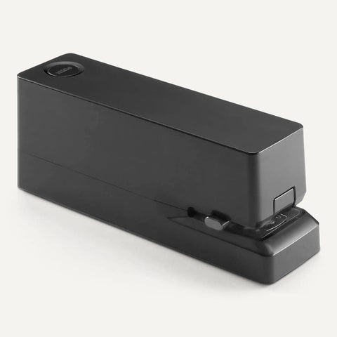 The Real Deal Electric Automatic Stapler For Desk Grind Crushing Through 25 Sheets Without Jamming side view, sleek black design, easy-access button.