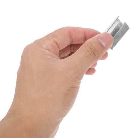 Heavy Duty Metal Banding Clip Buckle Set With Iron Seals For Packaging Strapping held in hand, showcasing size and material