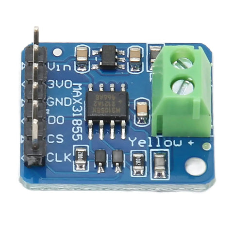 Close-up of K Type Thermocouple Sensor Module With MAX31855 SPI Interface And Direct Digital Temperature Output on a blue circuit board.