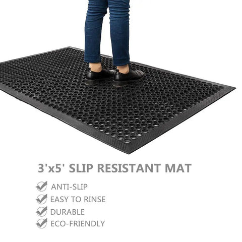 Person standing on Drainage Rubber Floor Mat With Holes Keeps Wet Areas Dry Heavy Duty Anti Fatigue Non Slip For Industrial Kitchen