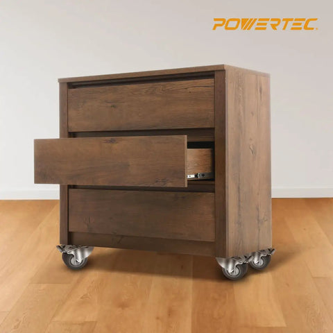 Heavy Duty 3 Inch Swivel Caster Wheels Equipped With Lock Down Dual Brakes And Roll Smooth Gray Rubber Tires For Tough Furniture Cart Dolly And Workbench Builds on a wooden drawer cabinet.