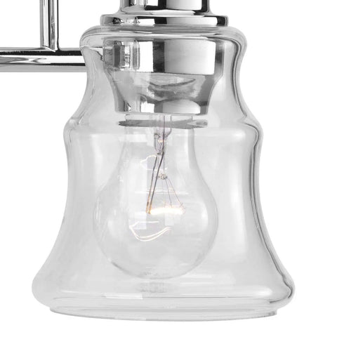 Clear glass shade detail of Litchfield Two Light Chrome Bath Vanity Light Fixture For Modern Coastal Bathrooms Spa Level Glow