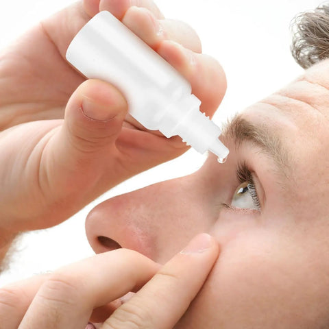 No Sweat Refills With This Five Piece Pack Featuring Four White 15ml Plastic Dropper Bottles Plus One Quick Pour Funnel, man applying eye drops.