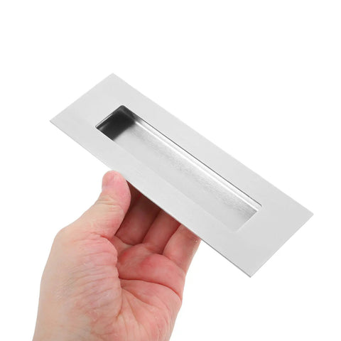 Person holding Recessed Sliding Door Handles Set 4 Pack Stainless Steel Invisible Cabinet Pulls, Sleek Modern Hardware.