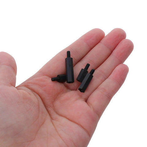 Must-Have Nylon Hex Spacer Standoff Screw Nut Kit For Epic Electronic Repairs And Computer Fixes With Durable Build And High Heat Resistance That Rocks Universal Compatibility Across All Gears. Black nylon hex spacers in hand