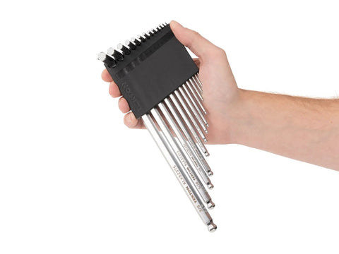 Hand holding Ball End Hex And Star Key Set With Holders 41-Piece Chrome Finish Tool Kit For Mechanics And DIY Enthusiasts Includes 0.050 To 3/8 In And 1.3 To 10 Mm Ball End Hex Keys Plus T6 To T50 Star Keys