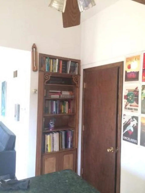 Slick Bookshelf Hidden Door Hinge System DIY Kit For Man Cave And Play Room Stealthy Stash Spot with books and door