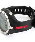 Freediving Computer With Backlit LCD Screen And Real Time Data, shown in black and red with strap and display details