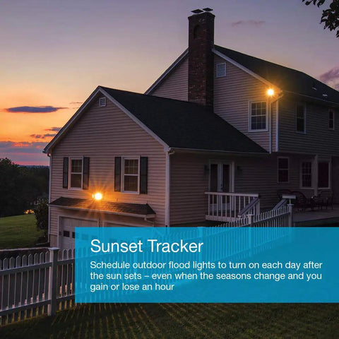 House exterior at sunset with Caseta Deluxe Smart Switch Kit controlling outdoor lights, highlighting smart home lighting system.