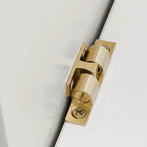 Close-up of 9 Piece Copper Door Ball Catches Set With Nickel Plated Cabinet Tension Latches 35mm on white door