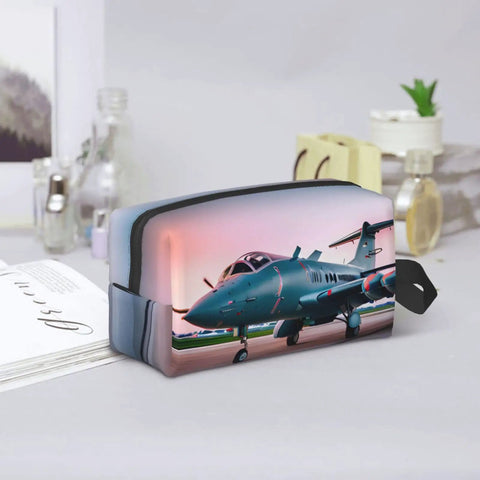 Aircraft Print Travel Cosmetic Bag Large Dopp Kit for Makeup and Toiletries on a table with decorative bottles, dual-sided design