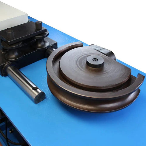 Pro Grade Shop Built Programmable Electric Hydraulic Tube Pipe Bender With PLC Auto Manual Controls And 3Hp Motor shows bending die on blue workbench.