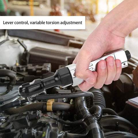 Pro Grade Pneumatic Ratchet Wrench With Quarter Inch Driver And Adjustable Twenty Five Foot Pound Torque For Quick Garage Fixes And Auto Tasks That Keep You From Breaking A Sweat in use on car engine with lever control.