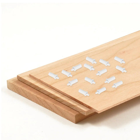 White Shutter Repair Pins on wooden surface, showcasing 120 Piece Movable Louver Fasteners, Heavy Duty Replacement Parts.