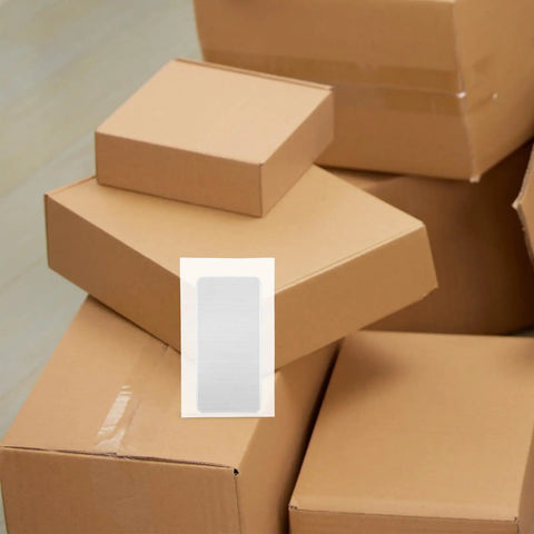 EPE Foam Packing Bags Set 100 Pcs White Thickened Protective Foam Bags For Shipping Fragile Items next to cardboard boxes