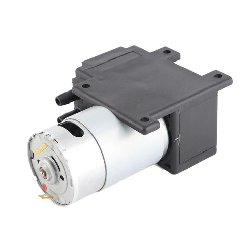 Heavy Duty 12V Mini DC Vacuum Pump Cranks Out Crazy Strong Suction Up To 10 Liters Per Minute With Compact Motor Design.