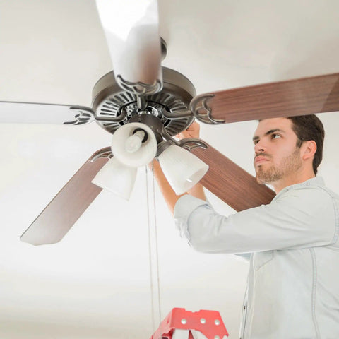 Man installing Heavy Duty Ceiling Fan Blade Screws 1/4-20 Inch By 3/8 Inch Carbon Steel Phillips Pan Head With Washers