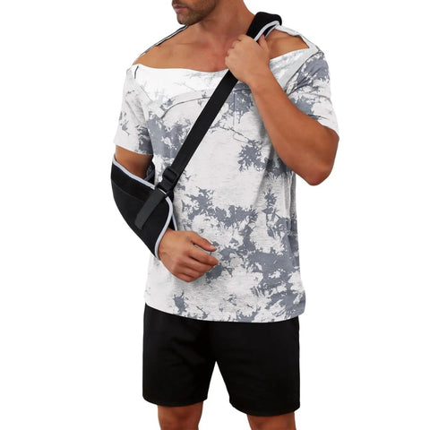 Man wearing Shoulder Surgery Shirt For Men With Easy Snap Front And Side Openings, Ultra Soft Knit Fabric, short sleeve, in sling