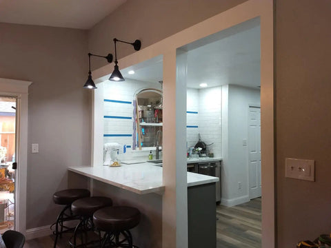 Frosted Black Vintage Industrial Wall Lamp Set, Adjustable Sconce Lighting over bar area in modern farmhouse kitchen.